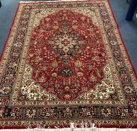 A Tabriz carpet 300 x 199cm